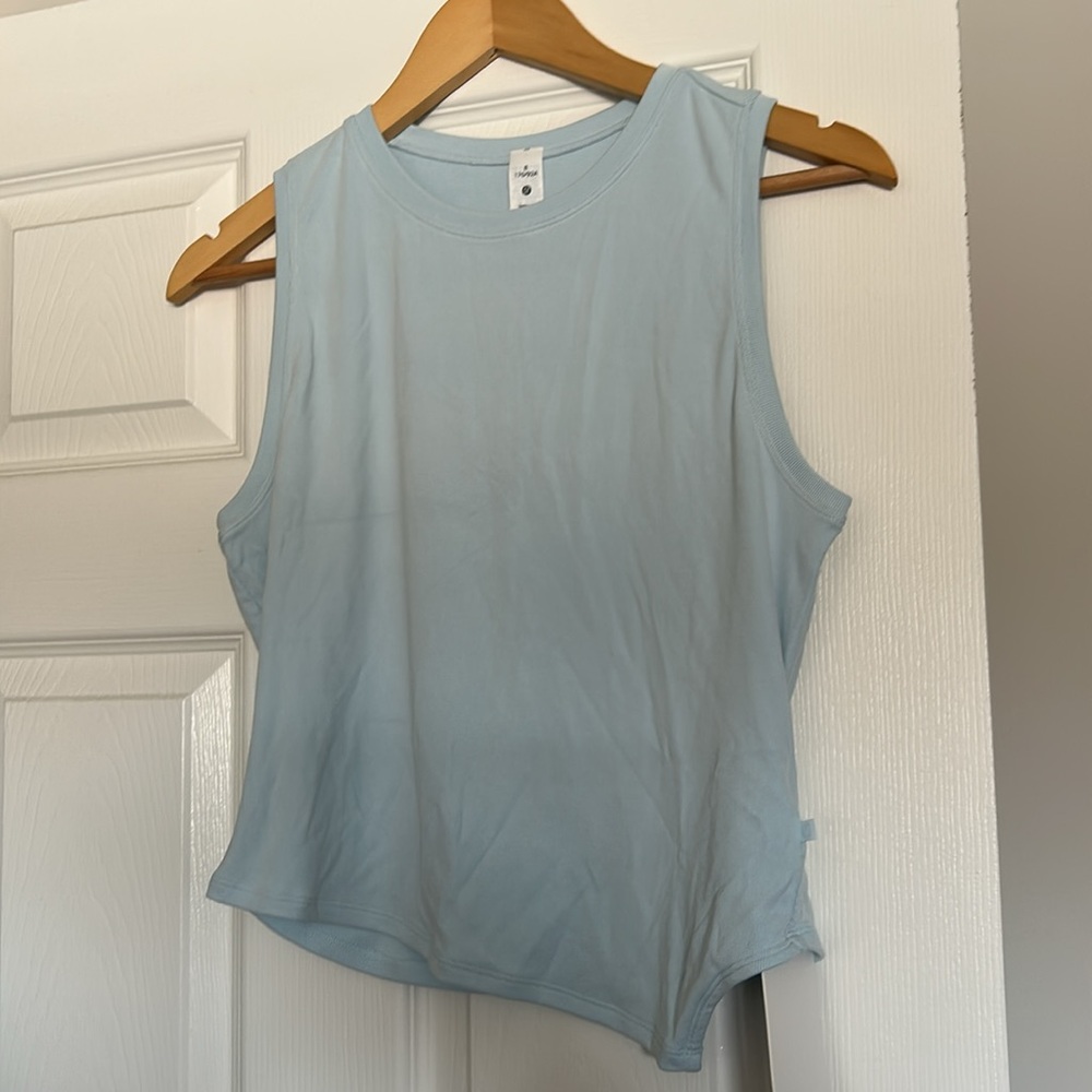 Light Blue Sleeveless Top and Gray Pants